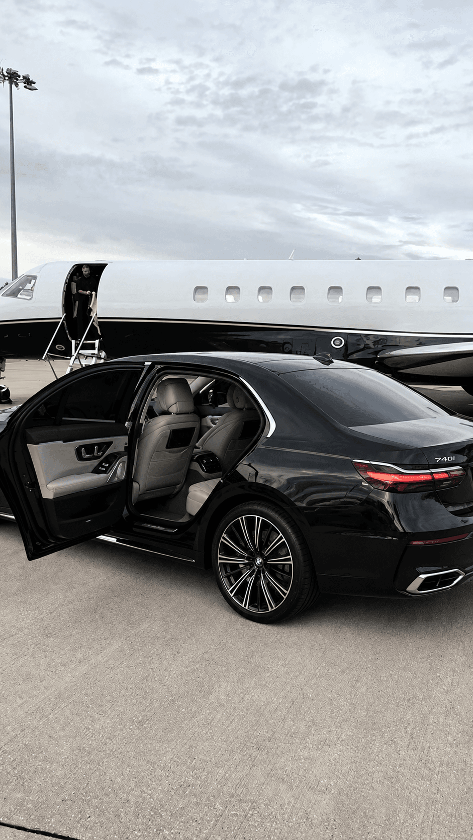 Chauffeur opening car door