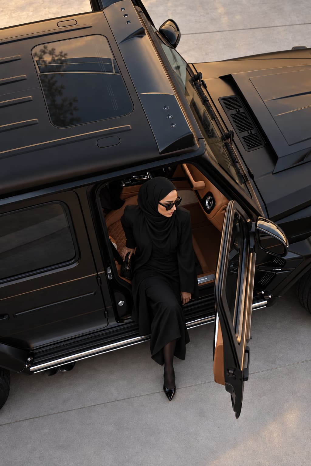 Passenger in luxury vehicle