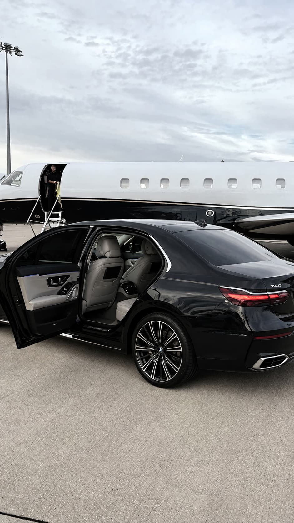 Chauffeur opening car door